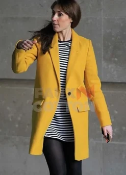 ALEX JONES TV HOST YELLOW COAT