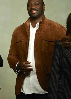 THE FIX (SEVVY JOHNSON) ADEWALE AKINNUOYE-AGBAJE BROWN JACKET